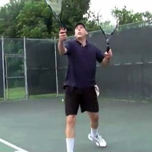 2-handed 2 racket tennis player