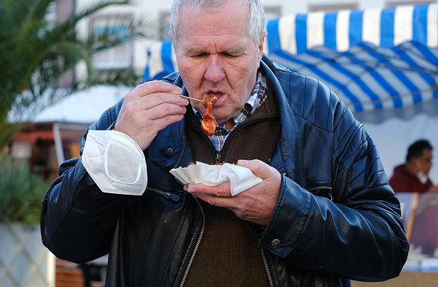 overweight man eating