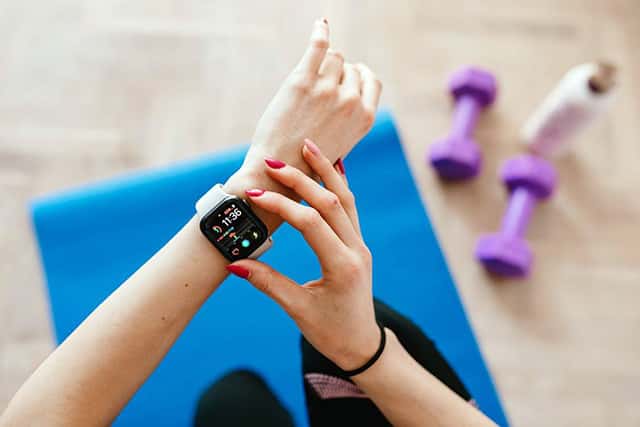 checking smartwatch