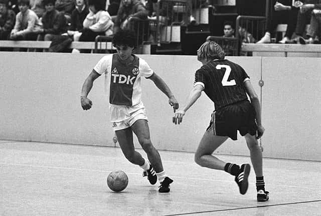 indoor soccer with a wall for the sideline