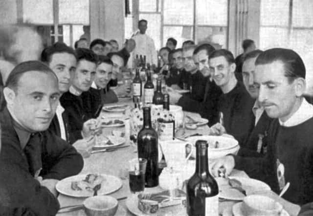 The French team enjoying their wine with their meal