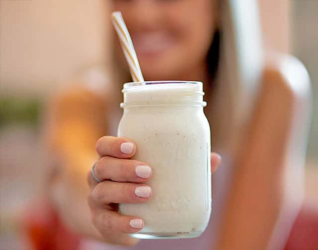 drinking a protein shake