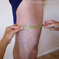 Mid-thigh girth measurement being taken on an athlete