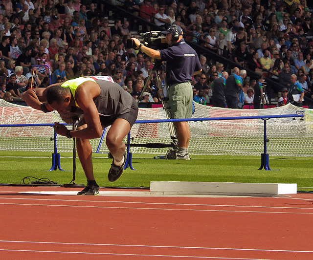 Ghanaian decathlete Atsu Nyamadi competing in the shot put at the 2014 Commonwealth Games
