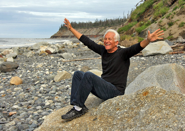 happy man on a rock