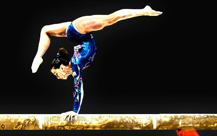 Which sport involves the balance beam uneven bars and rings About Artistic Gymnastics