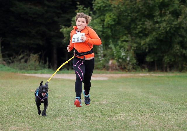 Canicross runner with their dog