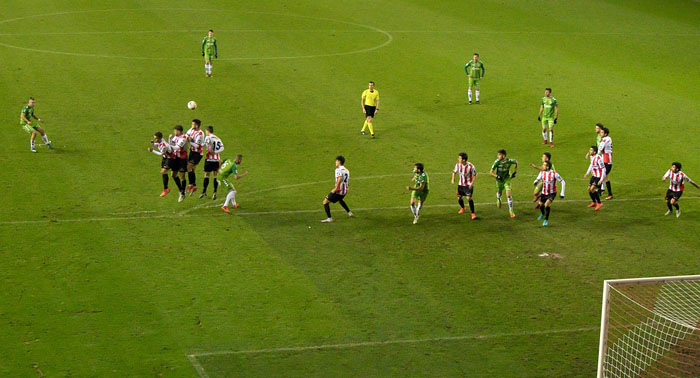 a football players attempt at goal