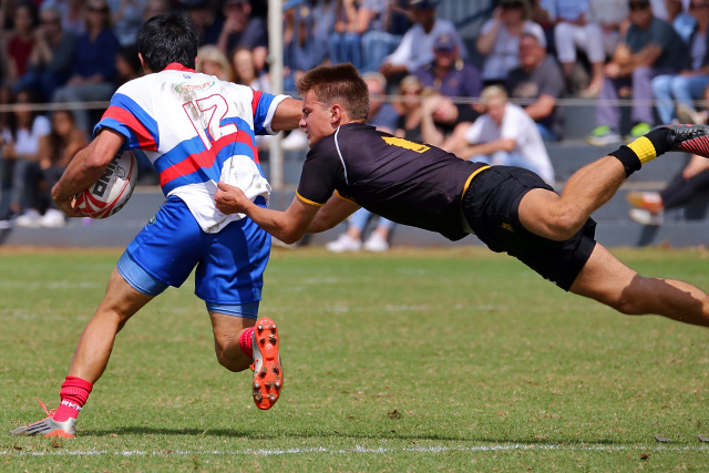 players playing fast-paced rugby x