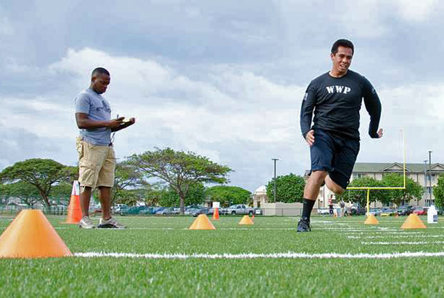 player performing the 3-cone drill