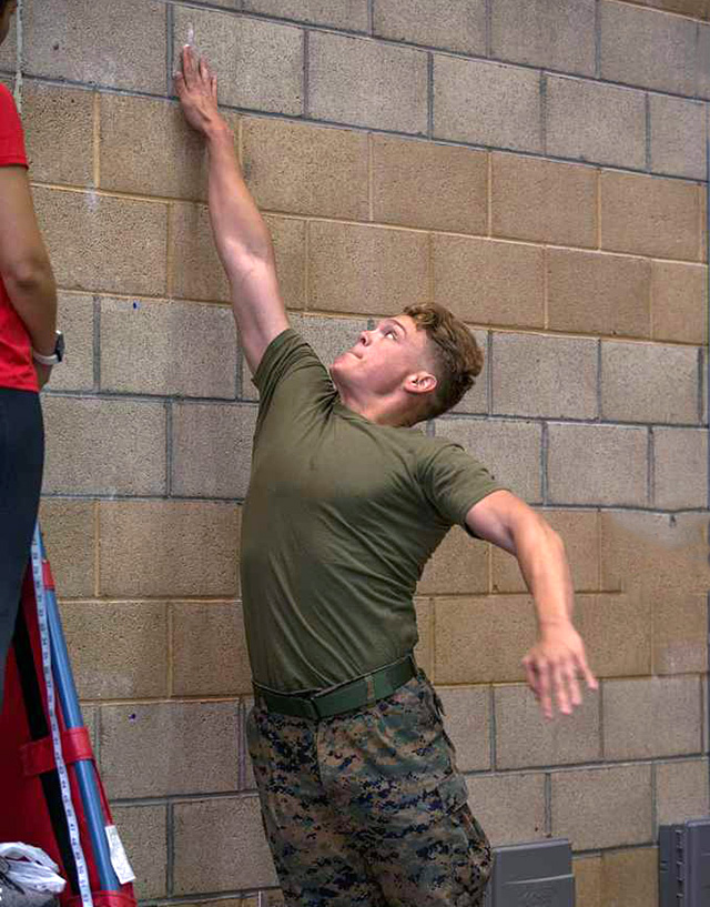 vertical jump test against a brick wall